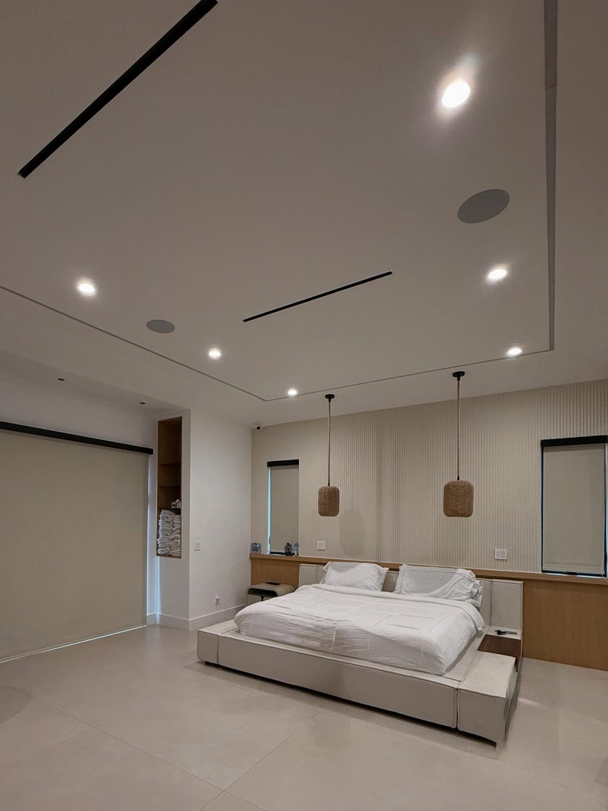 Blackout roller shades in a San Diego bedroom