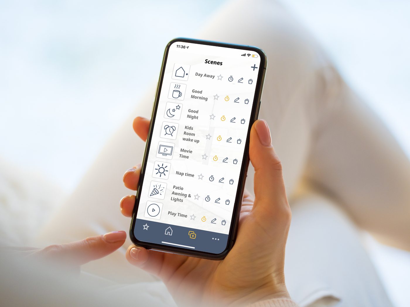 The Somfy TaHoma app showing scenes for controlling motorized shades from a phone
